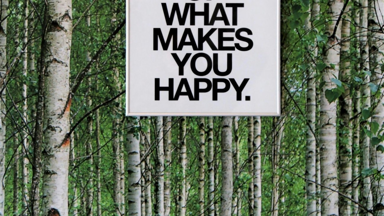 a sign in the woods
